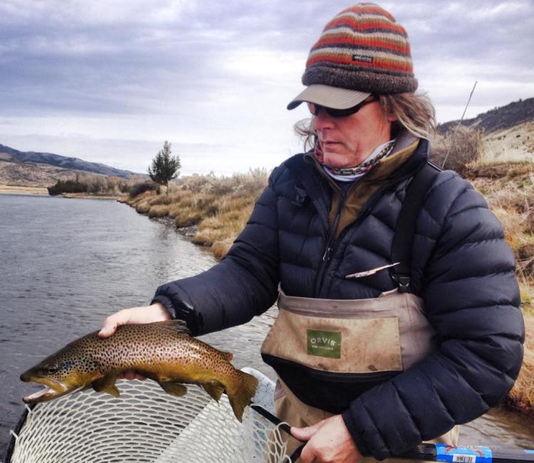 Fred with a solid Yellowstone River Brown - photo by Wolf Creek Angler